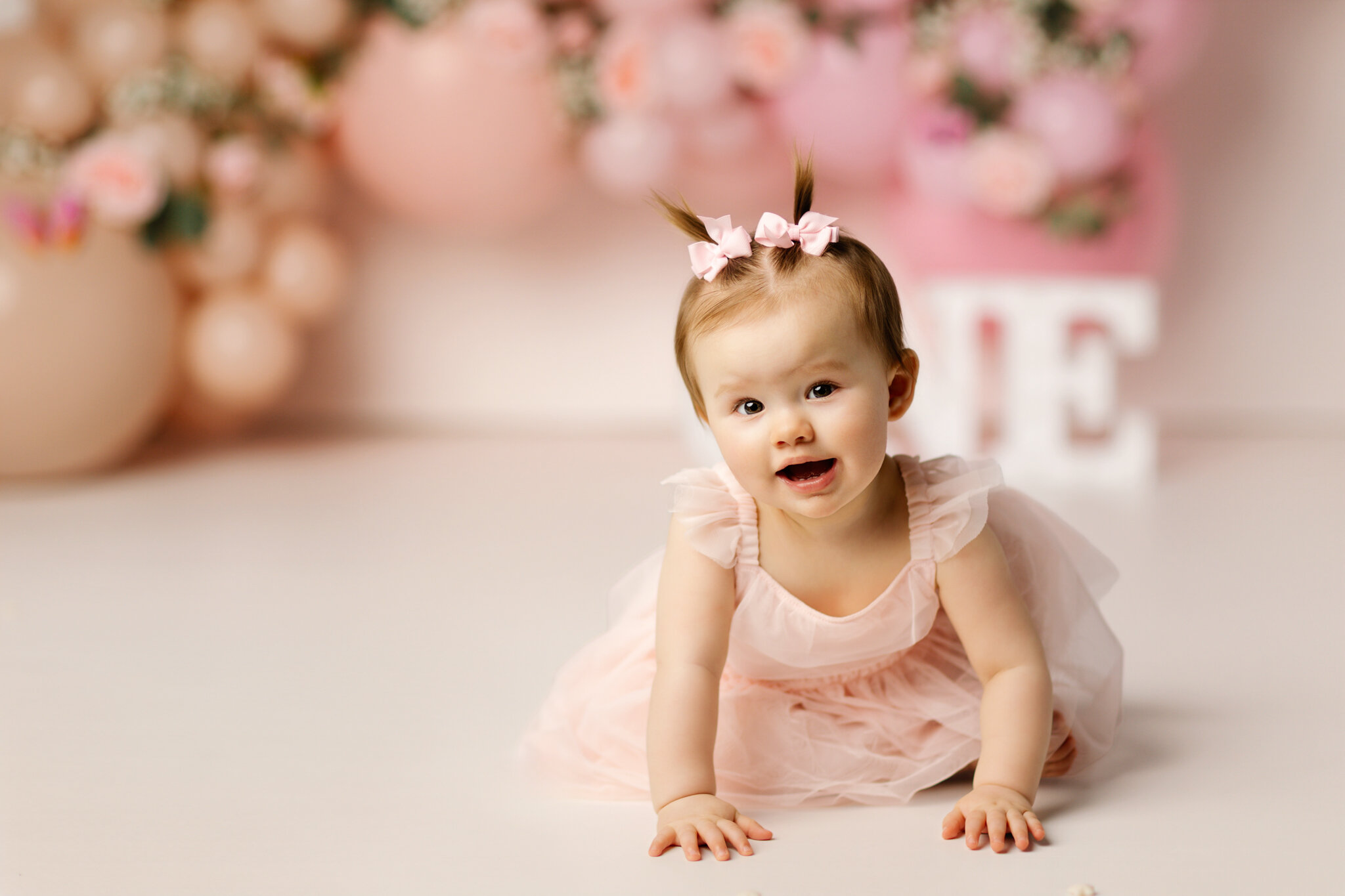 best NW Arkansas cake smash photographer, baby milestone session, baby photographer near me NWA